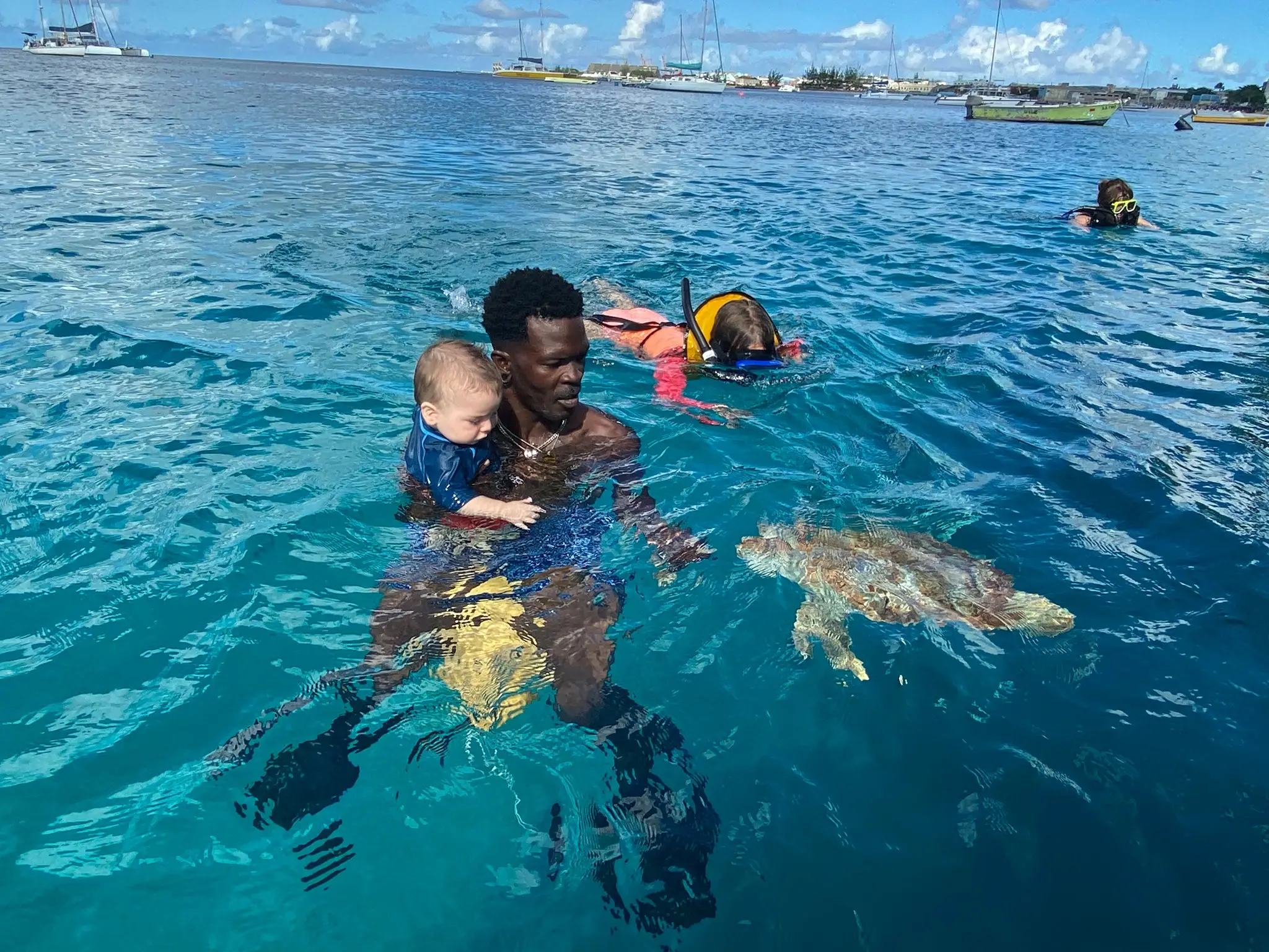 Captain with baby and turtles
