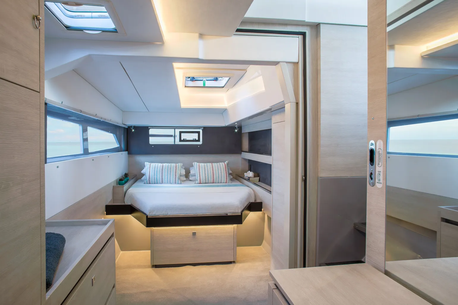 Master cabin with queen berth, skylights and panoramic hull windows