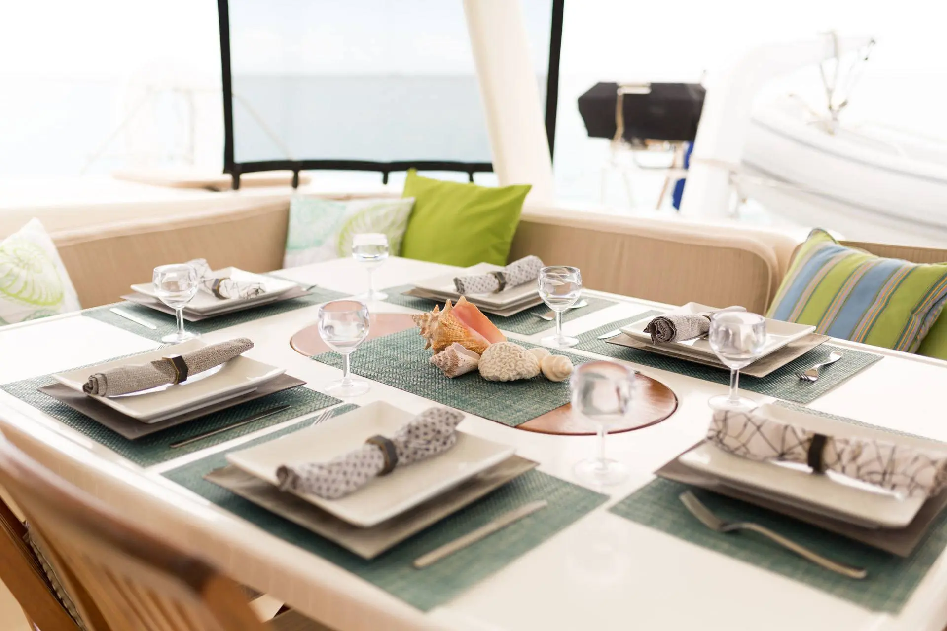 Cockpit dining table set with seashell centrepiece